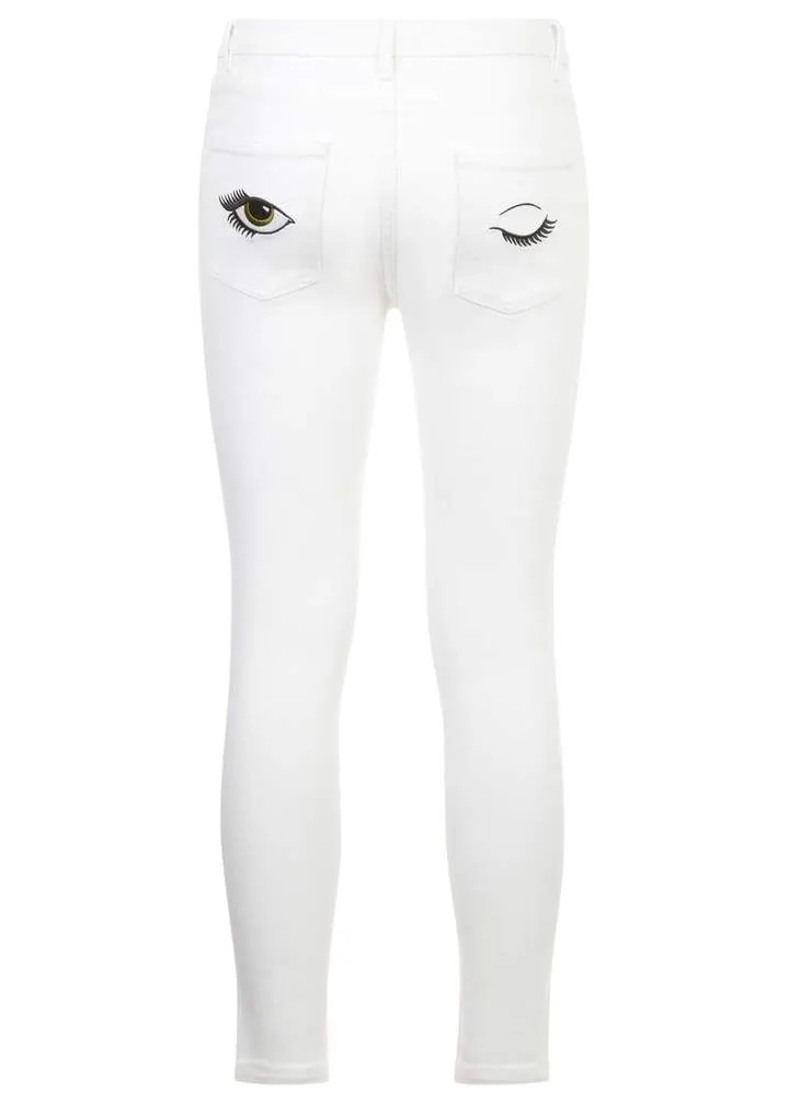 Girls White Skinny Jeans with Embroidered Eyes Pockets